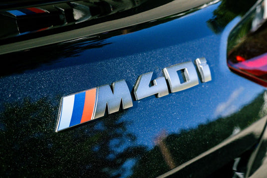 BMW M Series sports car on the road