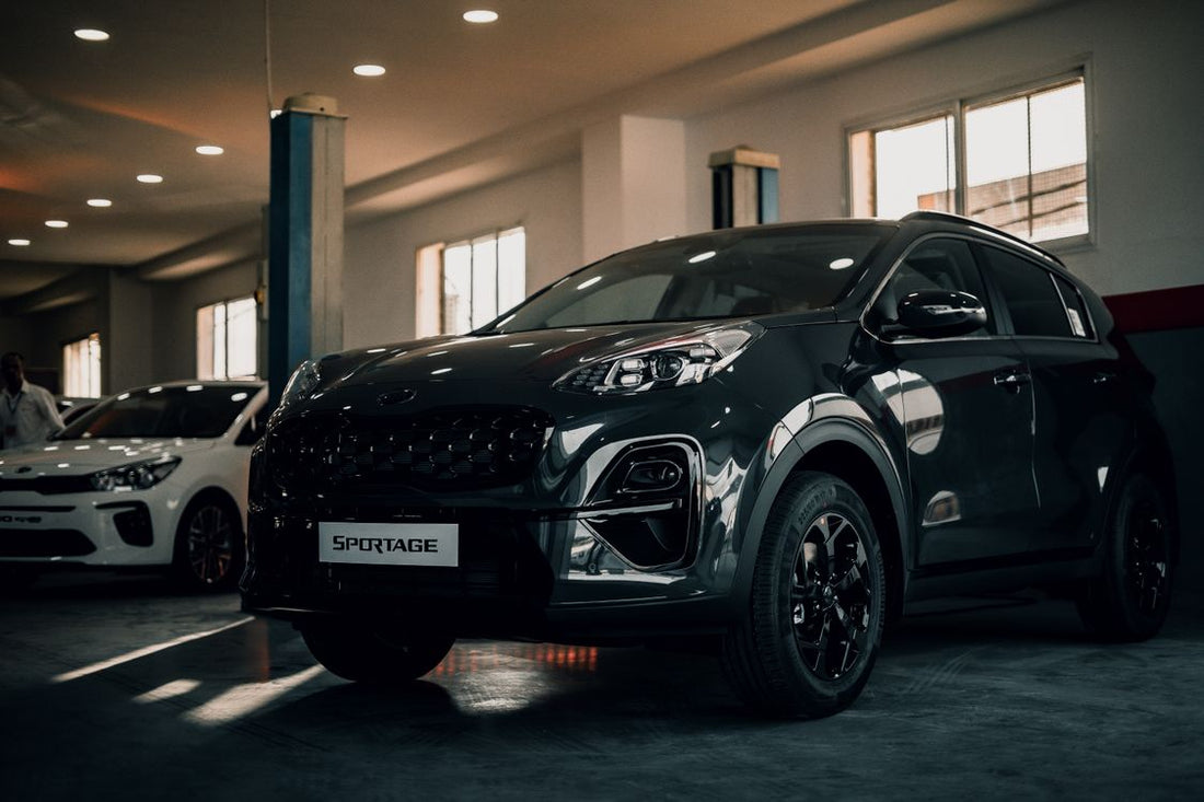 Kia Sportage in a professional showroom — Hyundai vs Kia used car comparison