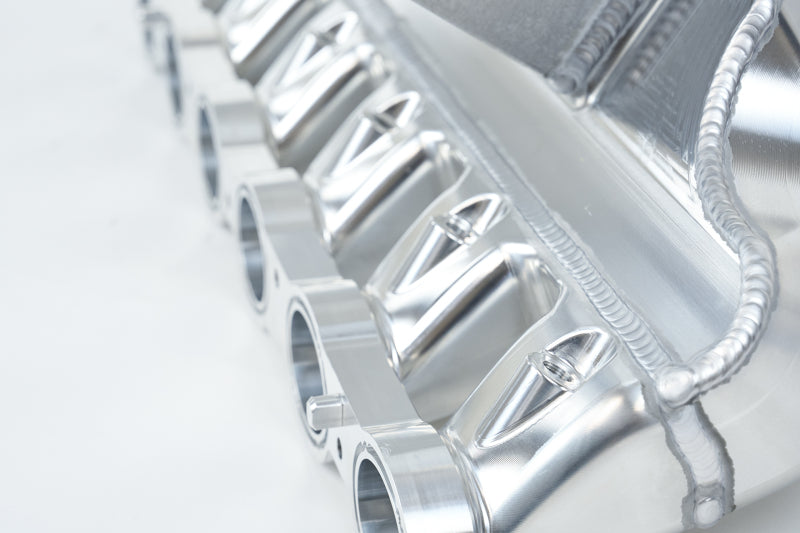 csf bmw m2/m3/m4 s58 comp & non-comp (g8x) charge-air cooler manifold - raw billet bmw m3 m4 g80 g82 g8x iconic garage