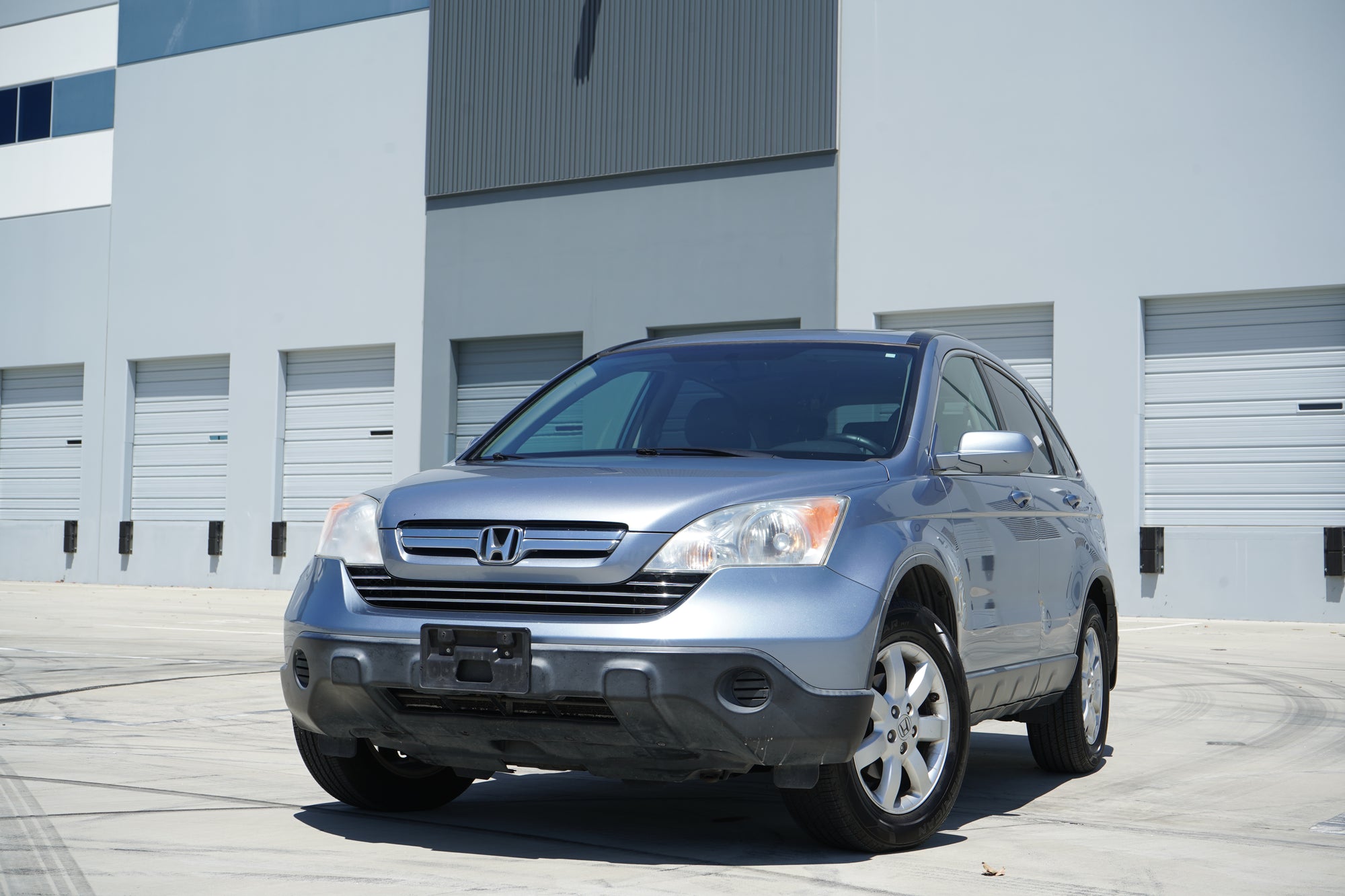 2009 Honda CR-V EX-L blue SUV front 3/4 exterior - Iconic Garage Burbank CA