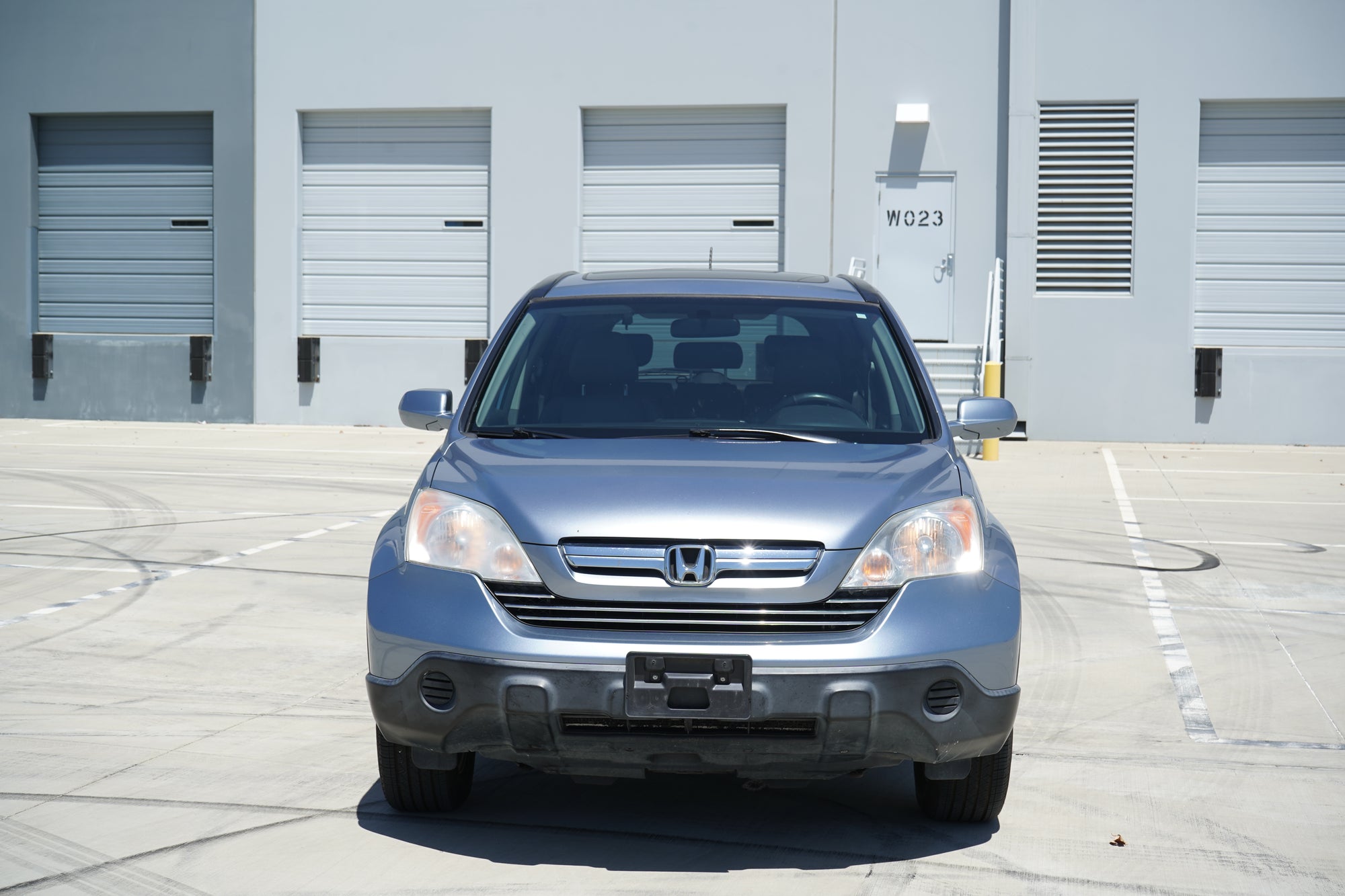 2009 Honda CR-V EX-L blue SUV front exterior - Iconic Garage Burbank CA