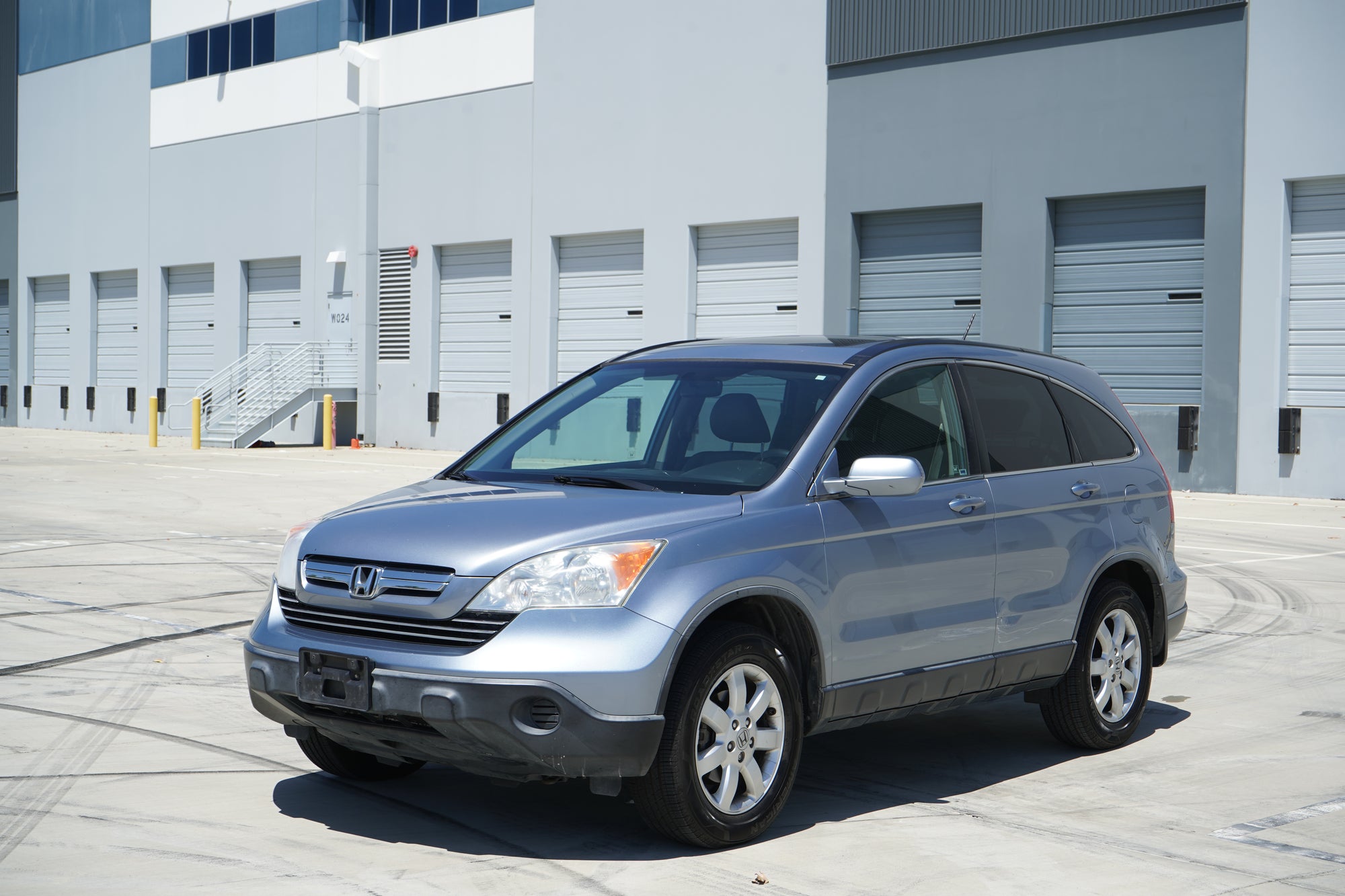2009 Honda CR-V EX-L blue SUV rear exterior - Iconic Garage Burbank CA
