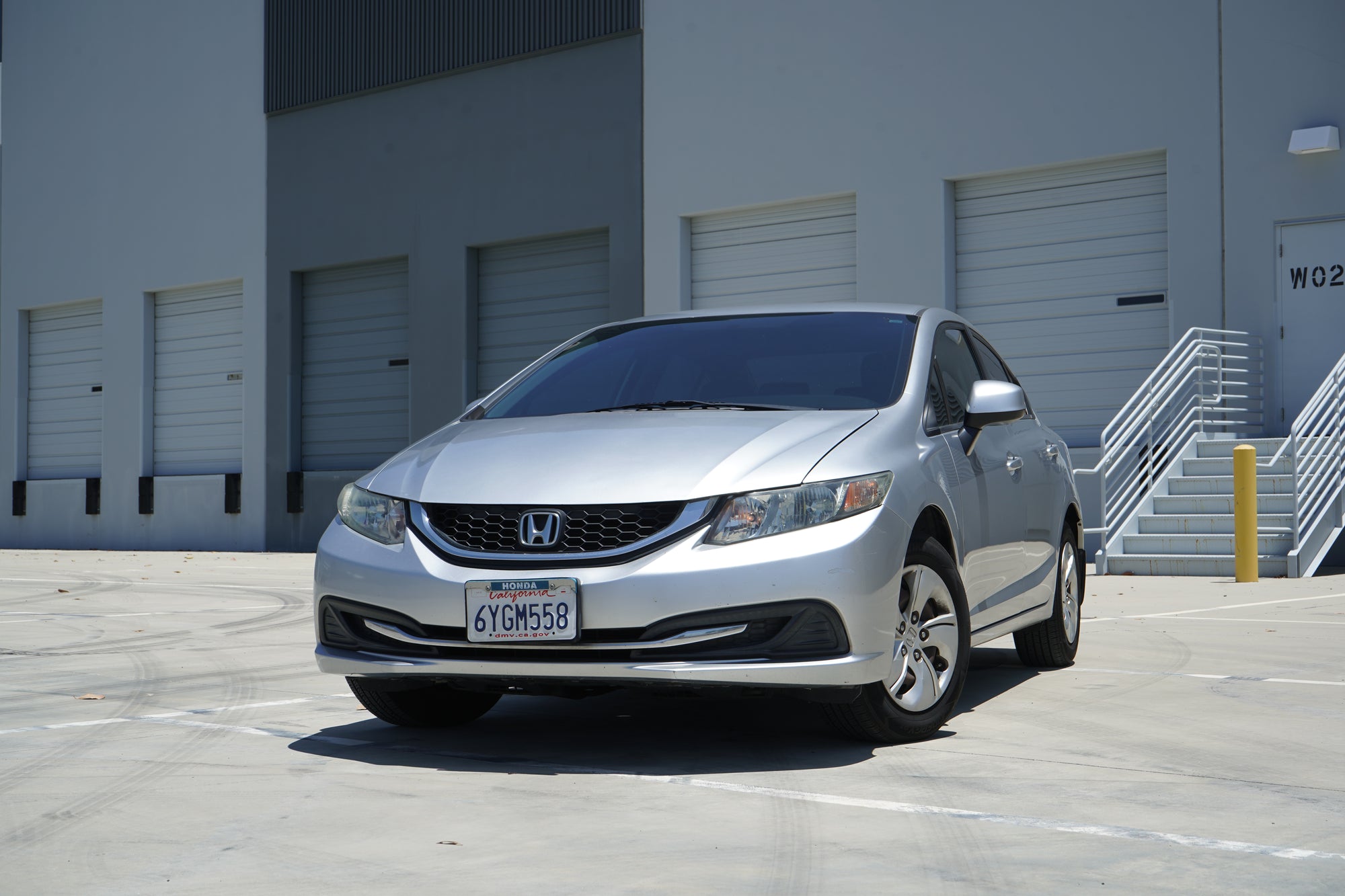 2013 Honda Civic LX silver sedan front 3/4 exterior - Iconic Garage Burbank CA