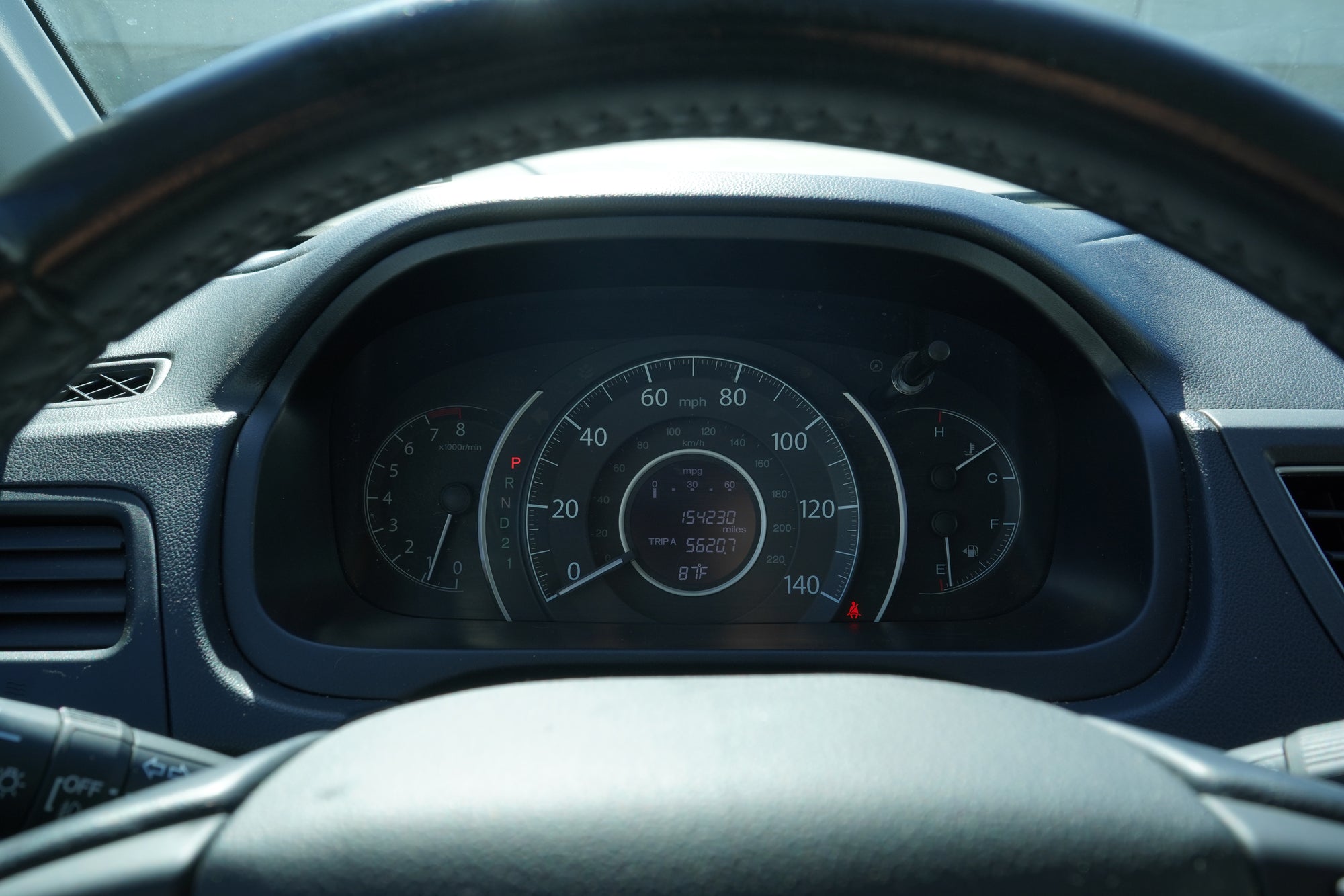 2013 Honda CR-V EX-L AWD odometer showing 154091 miles - Iconic Garage Burbank CA