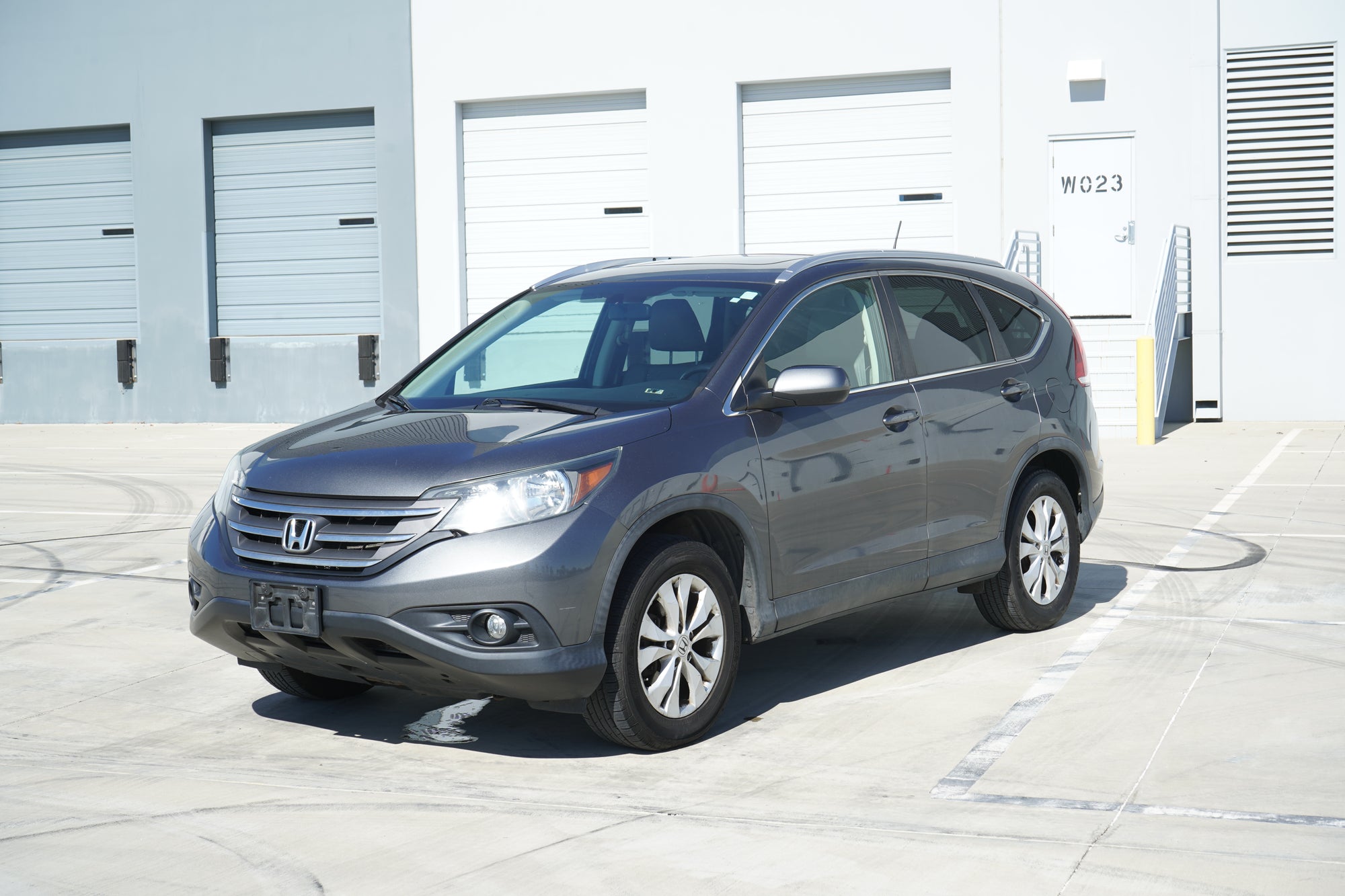 2013 Honda CR-V EX-L AWD gray interior dashboard - Iconic Garage Burbank CA