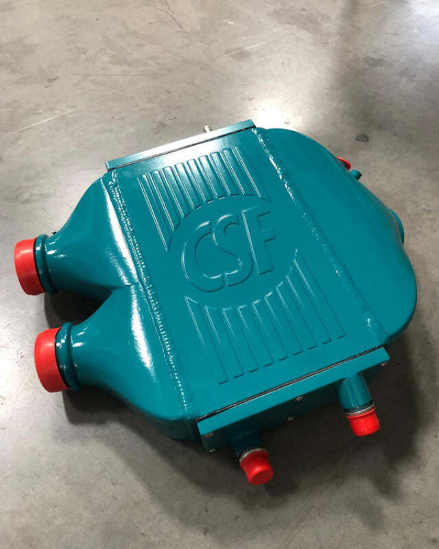 csf 2014+ bmw m3/m4 (f8x) top mount charge-air-cooler - custom teal bmw m3 m4 f80 f82 f8x iconic garage