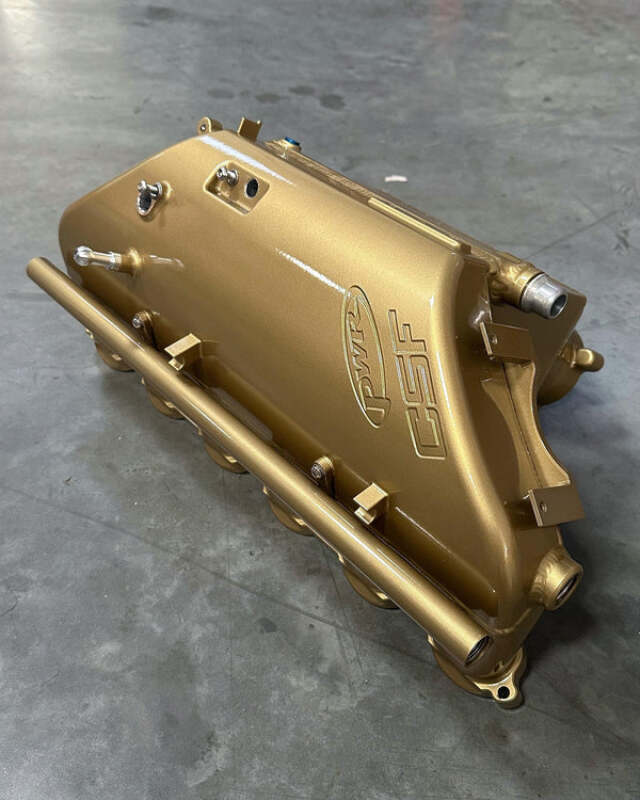 csf bmw m2/m3/m4 s58 (g8x) charge-air cooler manifold - bbs gold bmw m3 m4 g80 g82 g8x iconic garage
