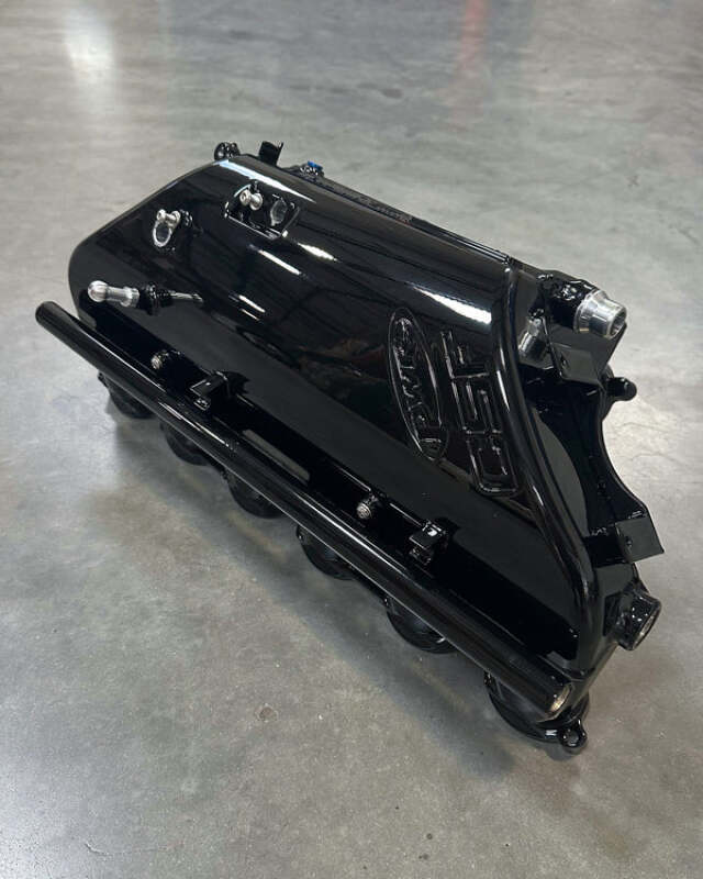 csf bmw m2/m3/m4 s58 (g8x) charge-air cooler manifold - gloss black bmw m3 m4 g80 g82 g8x iconic garage