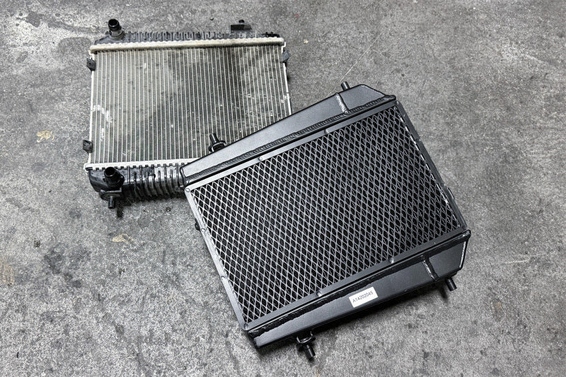 csf bmw g8x m3/m4/m2 high-performance auxiliary radiator - single radiator bmw m3 m4 g80 g82 g8x iconic garage