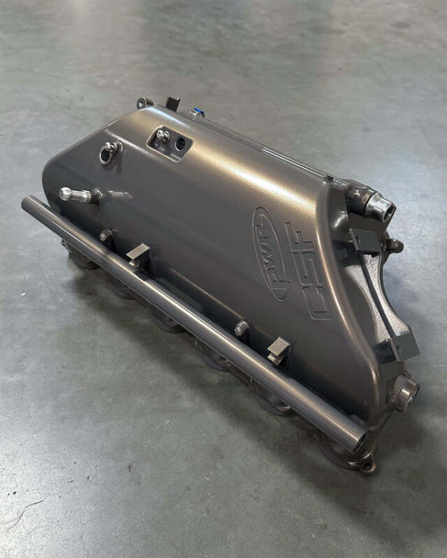 csf bmw m2/m3/m4 s58 (g8x) charge-air cooler manifold - golden hour bmw m3 m4 g80 g82 g8x iconic garage